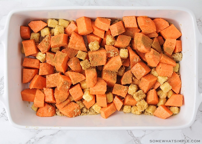 a baking pan of diced sweet potatoes