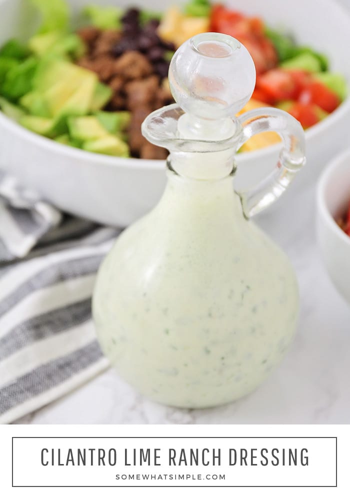 This creamy cilantro lime dressing is easy to make and it tastes amazing! Toss a handful of simple ingredients into a blender and in just a minute you'll have a delicious dressing that is crazy addictive! #cilantrolimedressing #cilantrolimedressingcaferio #cilantrolimedressingrecipe #easycilantrolimedressing #cilantrolimedressingfishtacos via @somewhatsimple