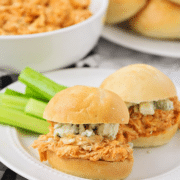 close up of 2 Buffalo Chicken Sliders with celery