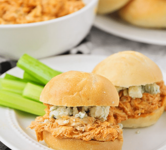 close up of 2 Buffalo Chicken Sliders with celery