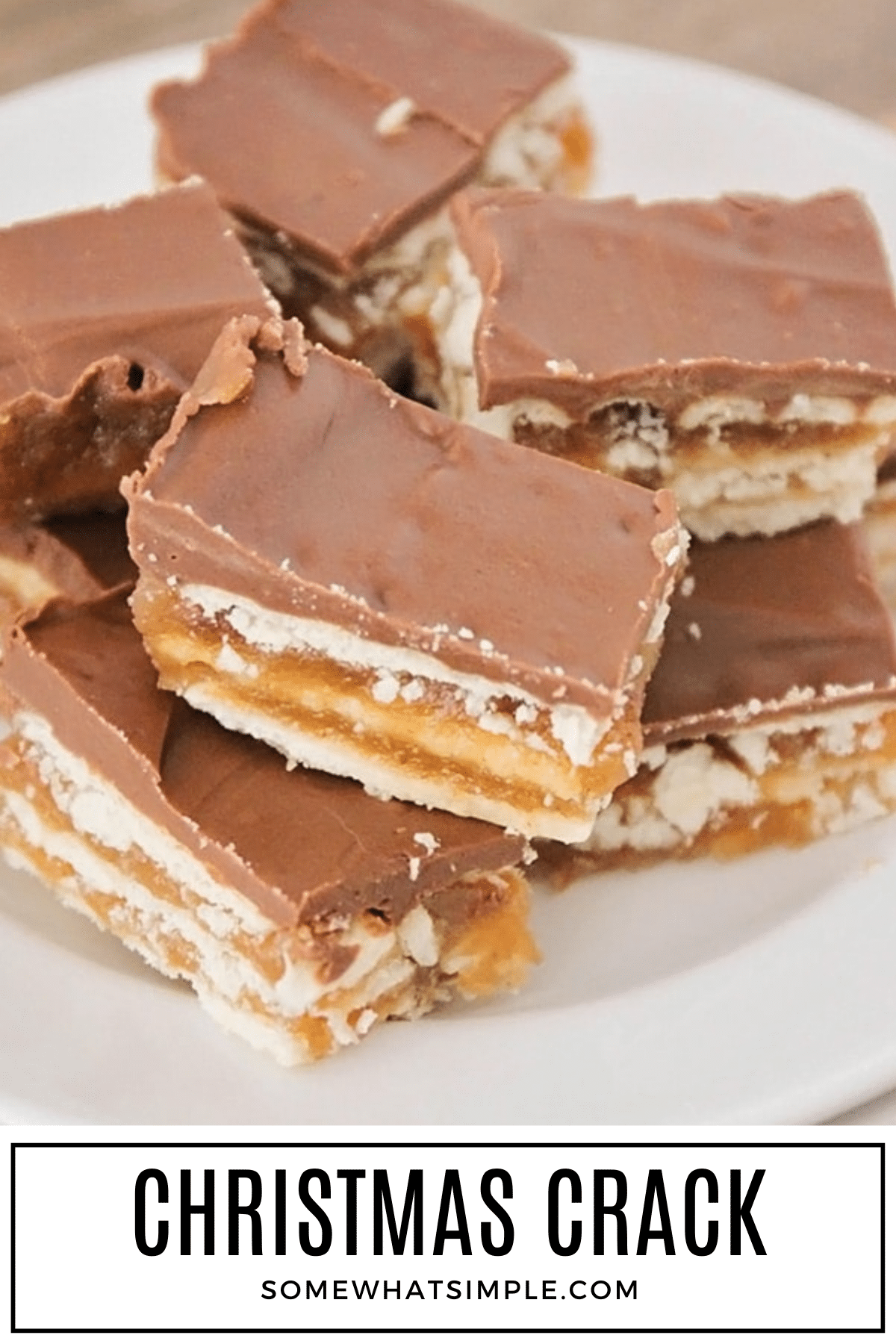 Salty, sweet, and addicting—this Christmas Crack Toffee with club crackers and chocolate is holiday magic in every bite! via @somewhatsimple