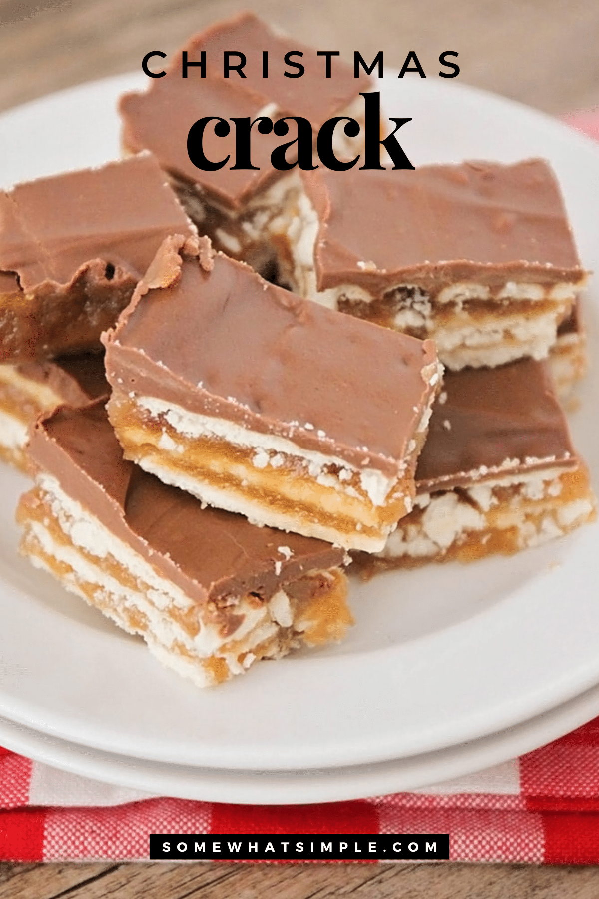 Salty, sweet, and addicting—this Christmas Crack Toffee with club crackers and chocolate is holiday magic in every bite! via @somewhatsimple
