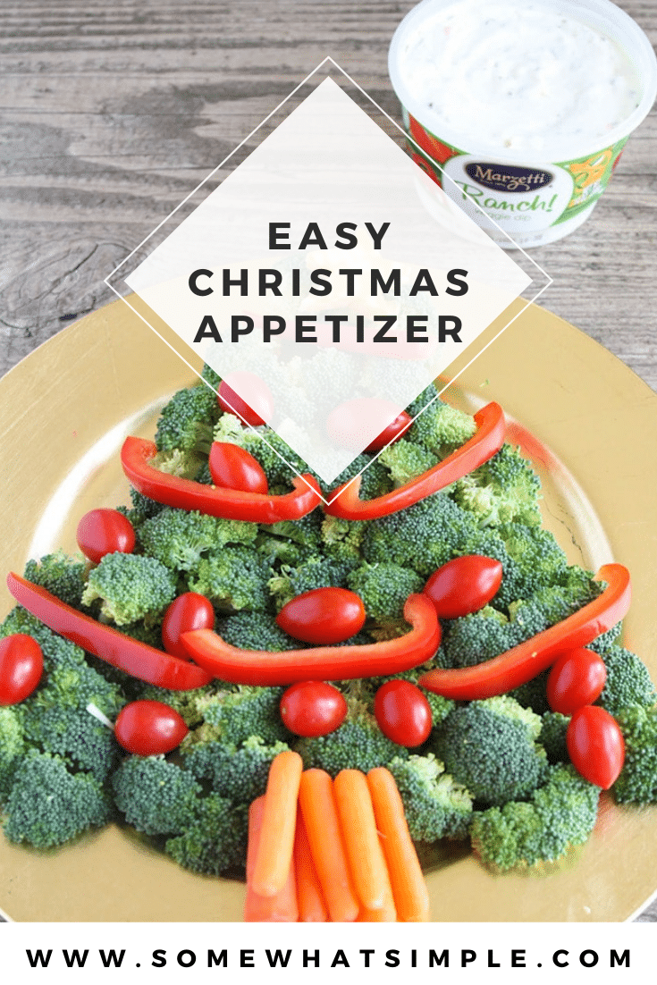 This Christmas tree veggie tray is simple and easy to make. The kids will love helping you arrange the veggies on the tray to make a fun Christmas tree shape that's perfect for the holidays. This veggie tray idea is simple and festive and makes the perfect holiday appetizer. via @somewhatsimple