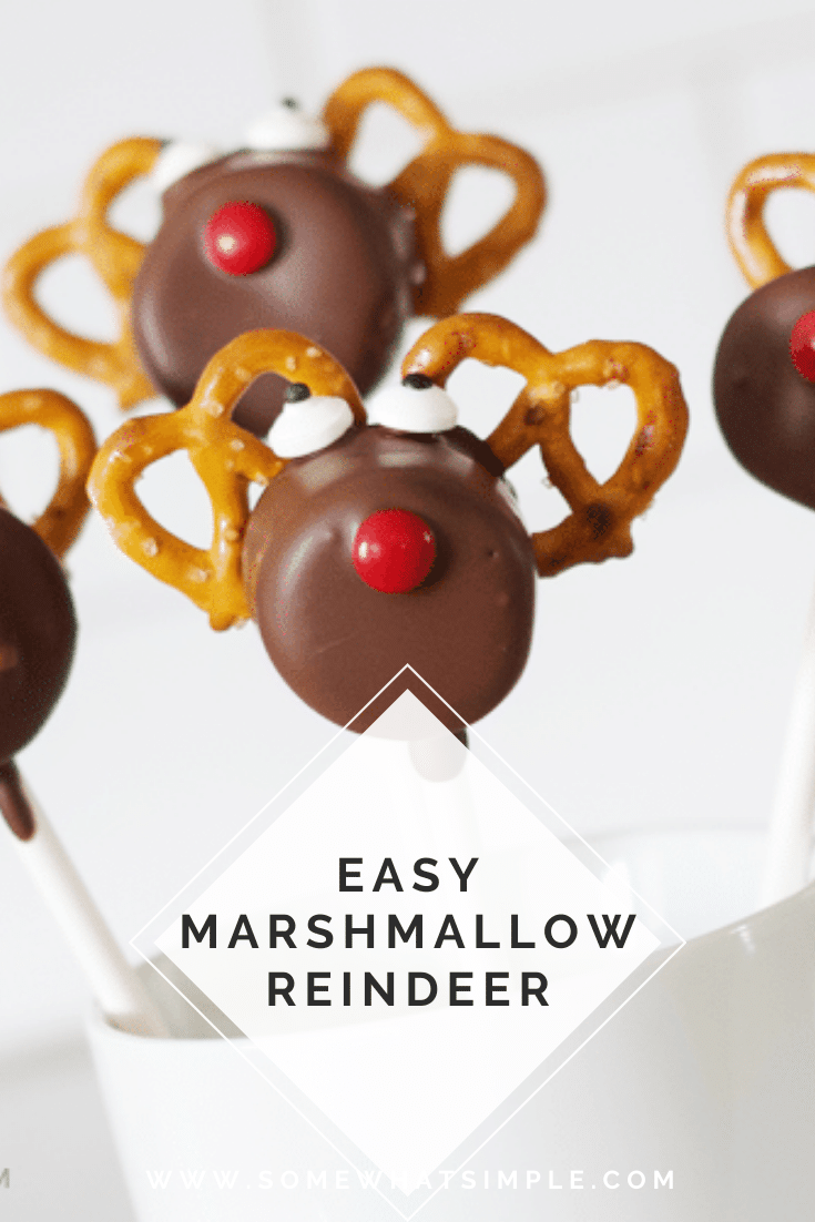 Are you ready for a fun and festive treat for the holiday season? These Reindeer Pretzel Marshmallow Pops are an easy treat your kids will love to create and then devour! They're really easy to assemble and make the perfect holiday treat during the Christmas season. They're made with pretzels, marshmallows and covered in chocolate. I promise, you won't be able to resist this salty sweet treat. via @somewhatsimple