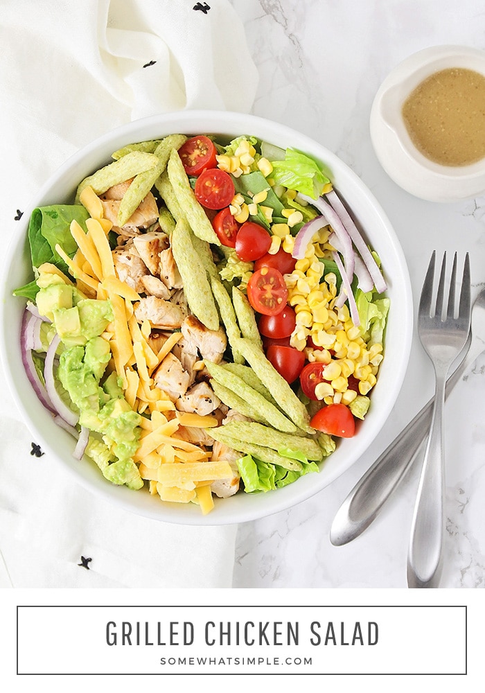 Grilled Chicken Salad is loaded with tasty ingredients, and is so easy to make! It's perfect for a quick lunch or light dinner! #salad #chicken #grilled #fresh #harvestsnaps via @somewhatsimple