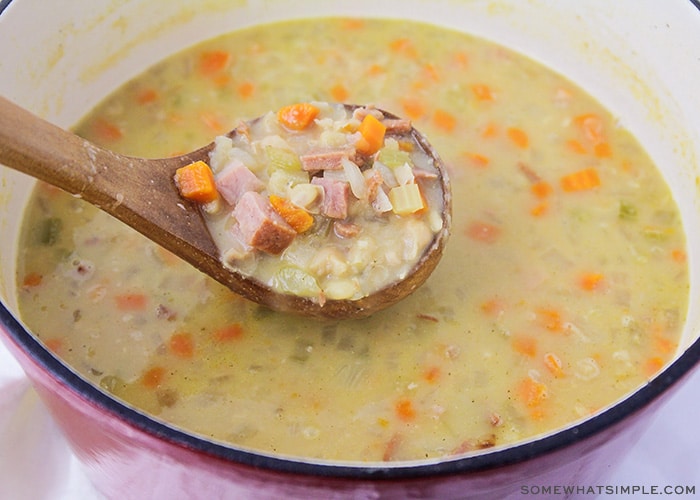 a pot filled with ham and bean soup