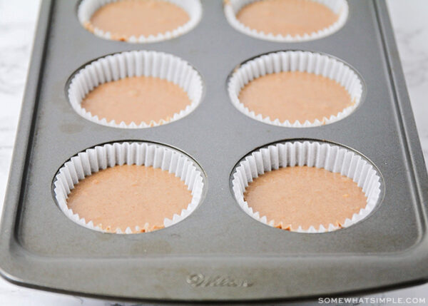 chocolate cupcake batter in muffin tins