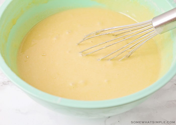 a bowl of yellow cake mix batter