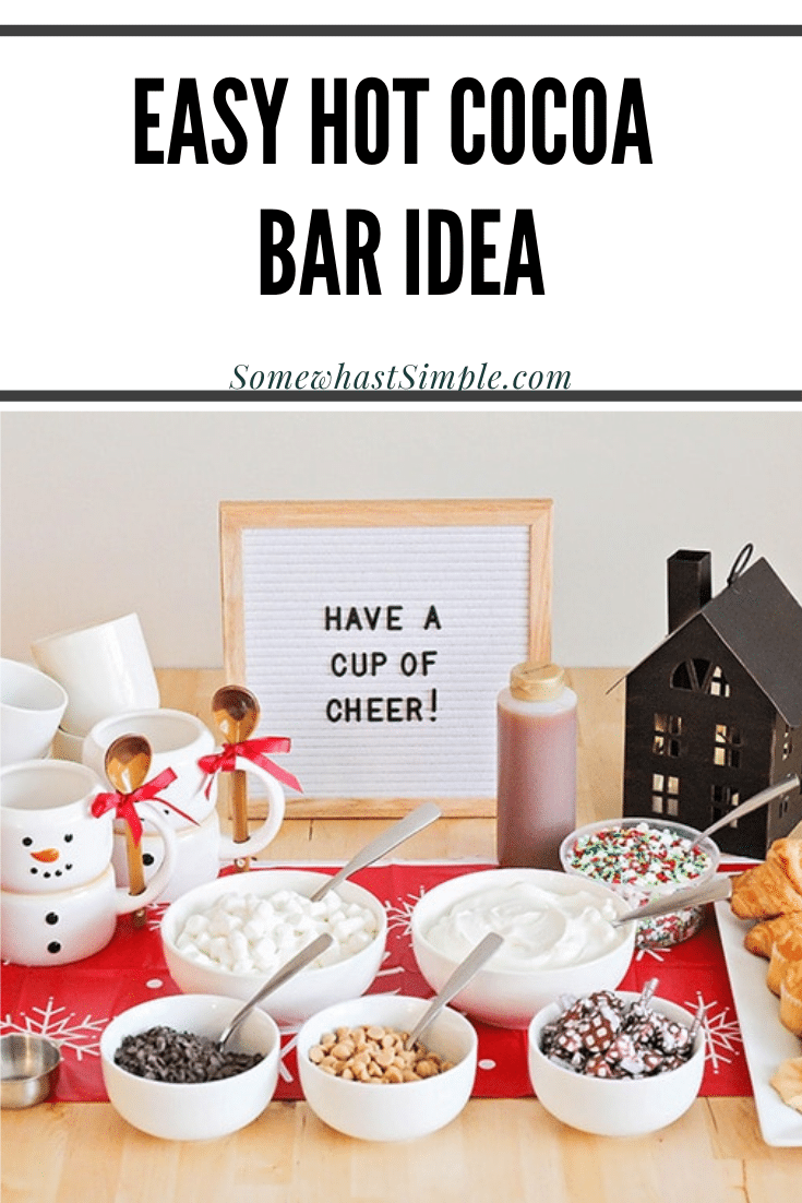 This sweet hot cocoa bar is a fun way to celebrate the season! Set out mix-ins, serve treats on the side, and enjoy a cup of holiday cheer! It's perfect to serve at your next holiday party or set it out for the family as a Christmas treat. via @somewhatsimple