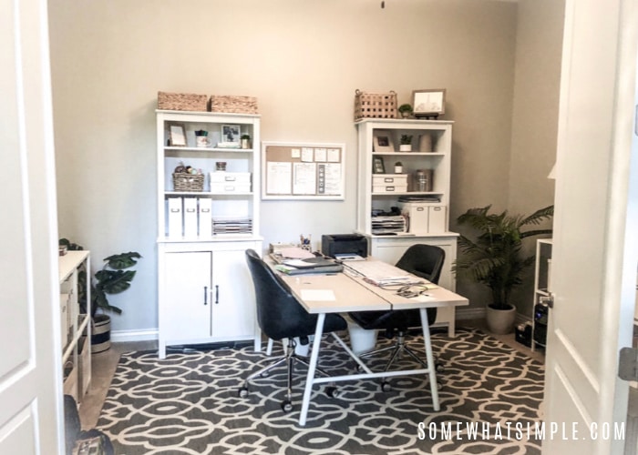 a home office with a desk for two people