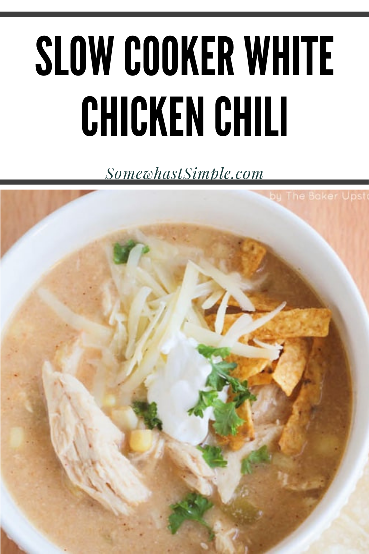 This slow cooker white chicken chili recipe is the perfect dinner on a chilly day.  Filled with tender chicken, white beans, vegetables and cream cheese, it doesn't get any better than this comfort food! via @somewhatsimple