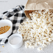 a paper bag filled with popcorn