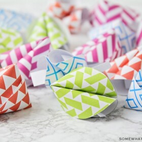 brightly colored fortune cookies made out of paper