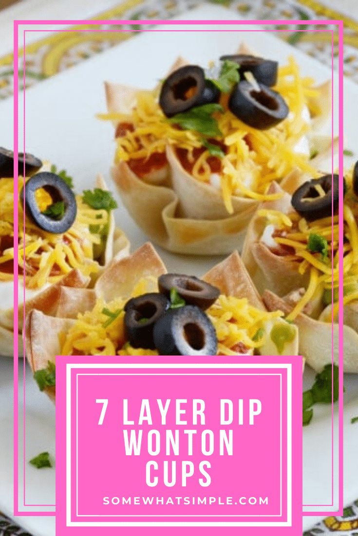 These seven layer dip cups are super simple to make and perfect as a side dish or appetizer.  Made with delicious guacamole, beans, salsa and other delicious layers they are incredibly delicious! #minisevenlayerdipcups #7layerdipappetizer #easysevenlayerdip #7layerdipmexicancups #mexicanappetizer via @somewhatsimple