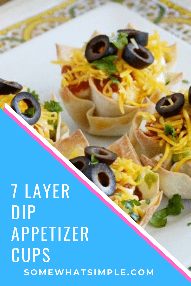 These seven layer dip cups are super simple to make and perfect as a side dish or appetizer.  Made with delicious guacamole, beans, salsa and other delicious layers they are incredibly delicious! #minisevenlayerdipcups #7layerdipappetizer #easysevenlayerdip #7layerdipmexicancups #mexicanappetizer via @somewhatsimple
