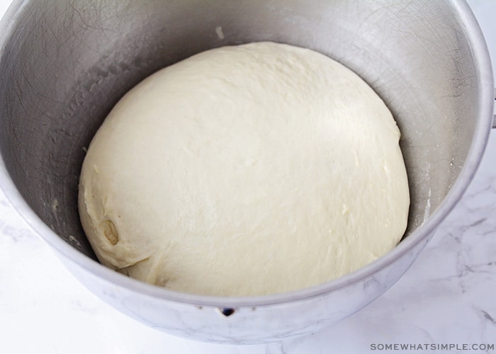 a bowl with bread dough
