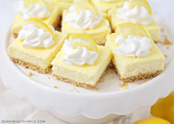 lemon cheesecake bars on a cookie stand