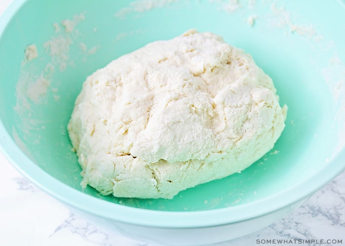 a ball of dough in a bowl