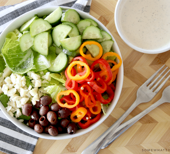 colorful garden salad with creamy italian dressing