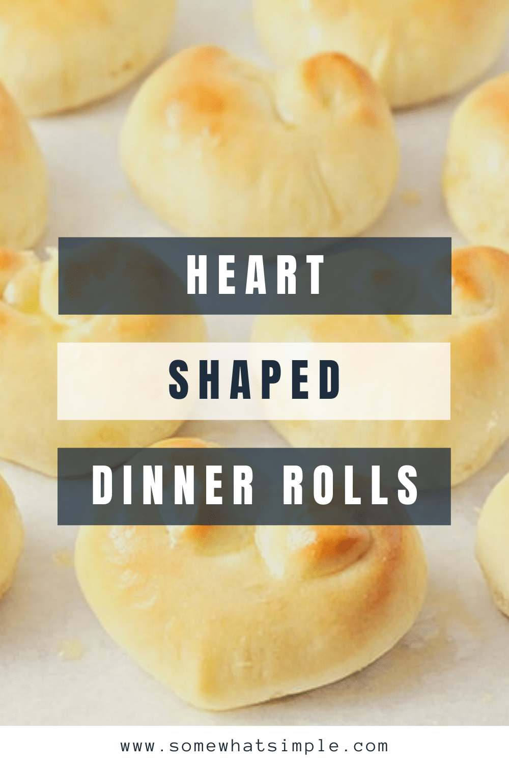 These heart shaped dinner rolls are a fun addition to any romantic homemade dinner.  In just a few simple steps you can transform what would be ordinary bread into a heart shaped masterpiece.  Whether it's Valentine's Day your anniversary or any other special occasion, this bread is perfect for that special dinner. via @somewhatsimple
