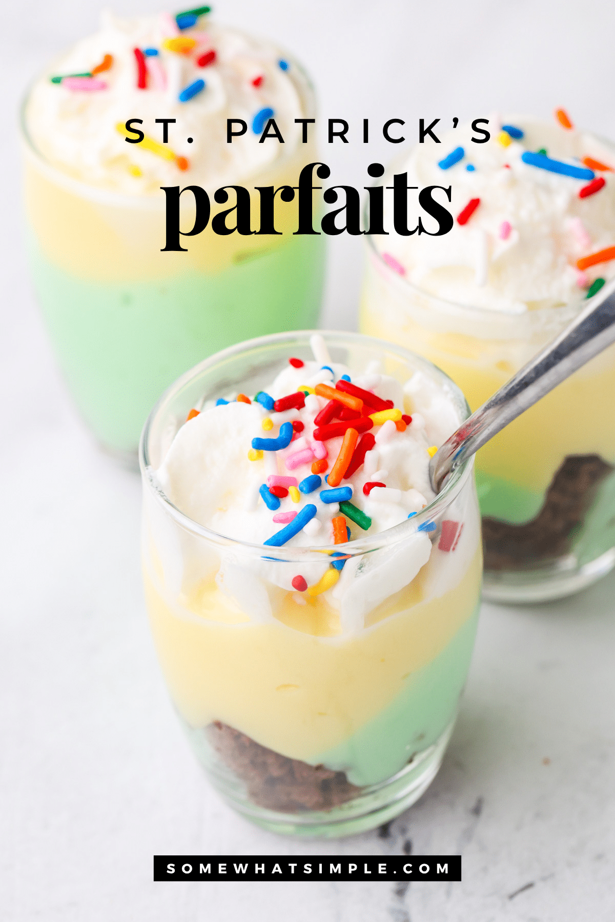 A vanilla pistachio parfait is a delicious way to celebrate St. Patrick's Day. This easy recipe is made with creamy vanilla and pistachio pudding over a bed a brownie crumbs. Ready in seconds, this is an easy dessert to make for a party or an afternoon snack. #stpatricksdayparfait #pistachioparfait #pistachioparfaitrecipe #pistachiopuddingparfait via @somewhatsimple