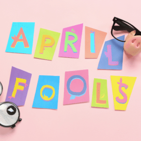 letters cut from paper that spell "april fools"