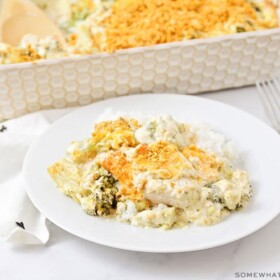 A plate full of chicken divan with a casserole dish full of this easy recipe in the background