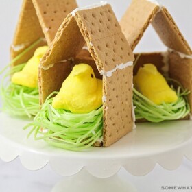 a graham cracker bird house with a peep candy