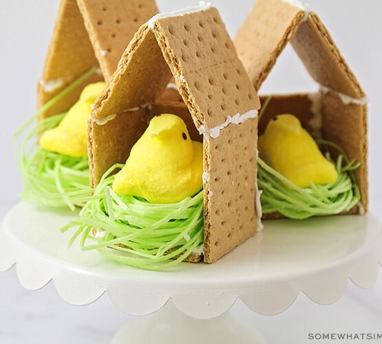 a graham cracker bird house with a peep candy