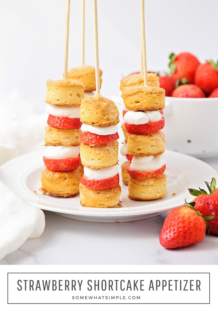 Strawberry Shortcake kabobs are fresh, easy and delicious! Layers of sweet biscuits, whipped cream, and tart strawberries make a simple appetizer or dessert that looks impressive!#strawberryshortcakeappetizer #strawberryshortcake #easystrawberryshortcakeappetizer #strawberryshortcakeappetizerrecipe via @somewhatsimple