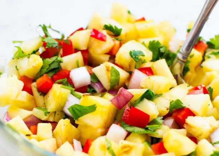 a bowl of homemade pineapple salsa