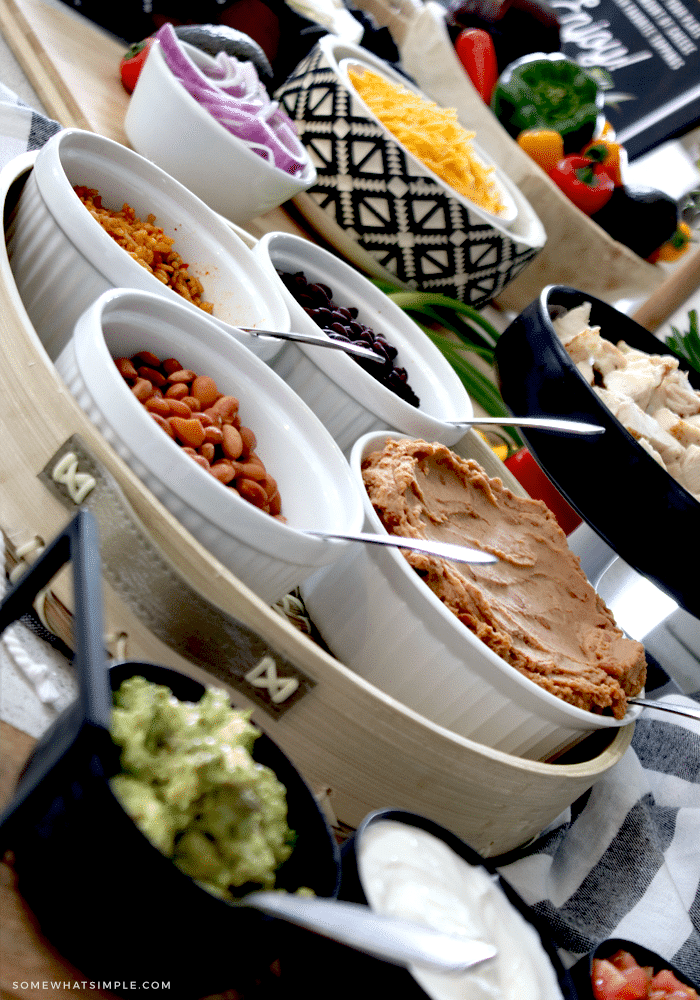 bowls of black, pinto and refried beans