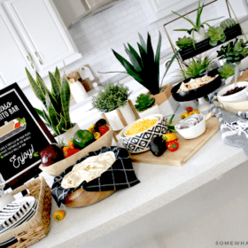 a burrito bar on a kitchen counter