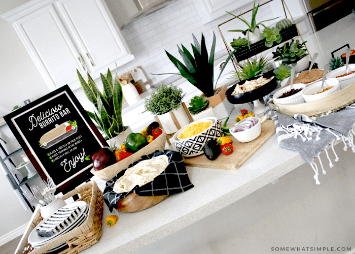 a burrito bar on a kitchen counter