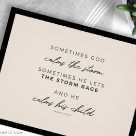 quote about god calming the storm in a black frame