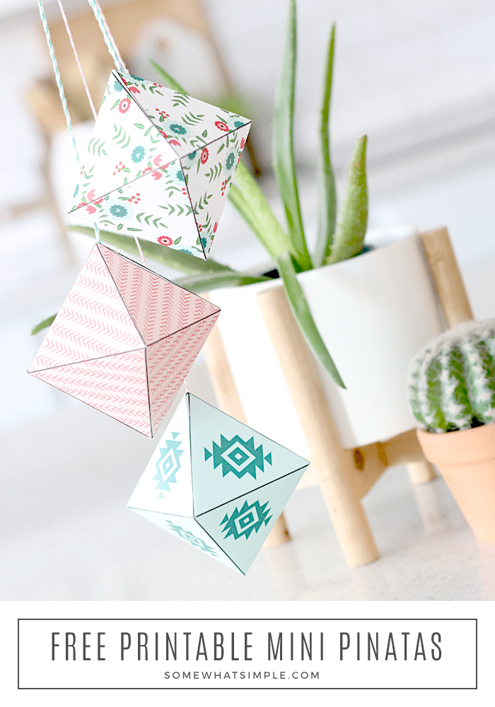 These fun mini piñatas are the finishing touch you'll need to make your next Cinco De Mayo fiesta a smashing hit! Download your free printable today and get ready for a DIY project that is simple and fun! They're easy to make and everyone will love them! #minipinatas #diyminipinatas #minipinatastemplate #partyideas #freeprintable #cincodemayo #decorations via @somewhatsimple