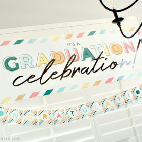 graduation party with hanging banner on the window