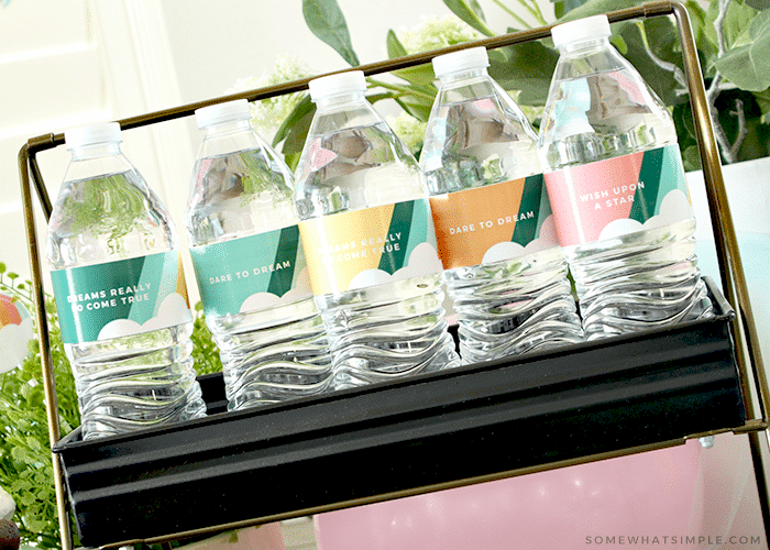 water bottles for a graduation wrapped in cute labels with stripes