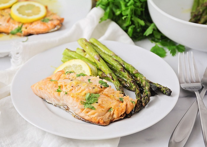 This grilled salmon and asparagus is incredibly flavorful and delicious, and ready in less than thirty minutes. It's the perfect summer meal!