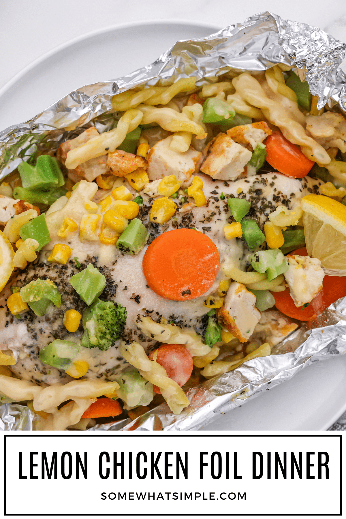 Get dinner on the table in less that 30 minutes with nearly no cleanup at all thanks to this delicious Lemon Chicken Pasta Foil Dinner! Foil dinners have all of the delicious flavors of camping without having to sleep outside. #foildinner #chicken #pasta #howtomakeafoilpacketdinner #easydinner via @somewhatsimple