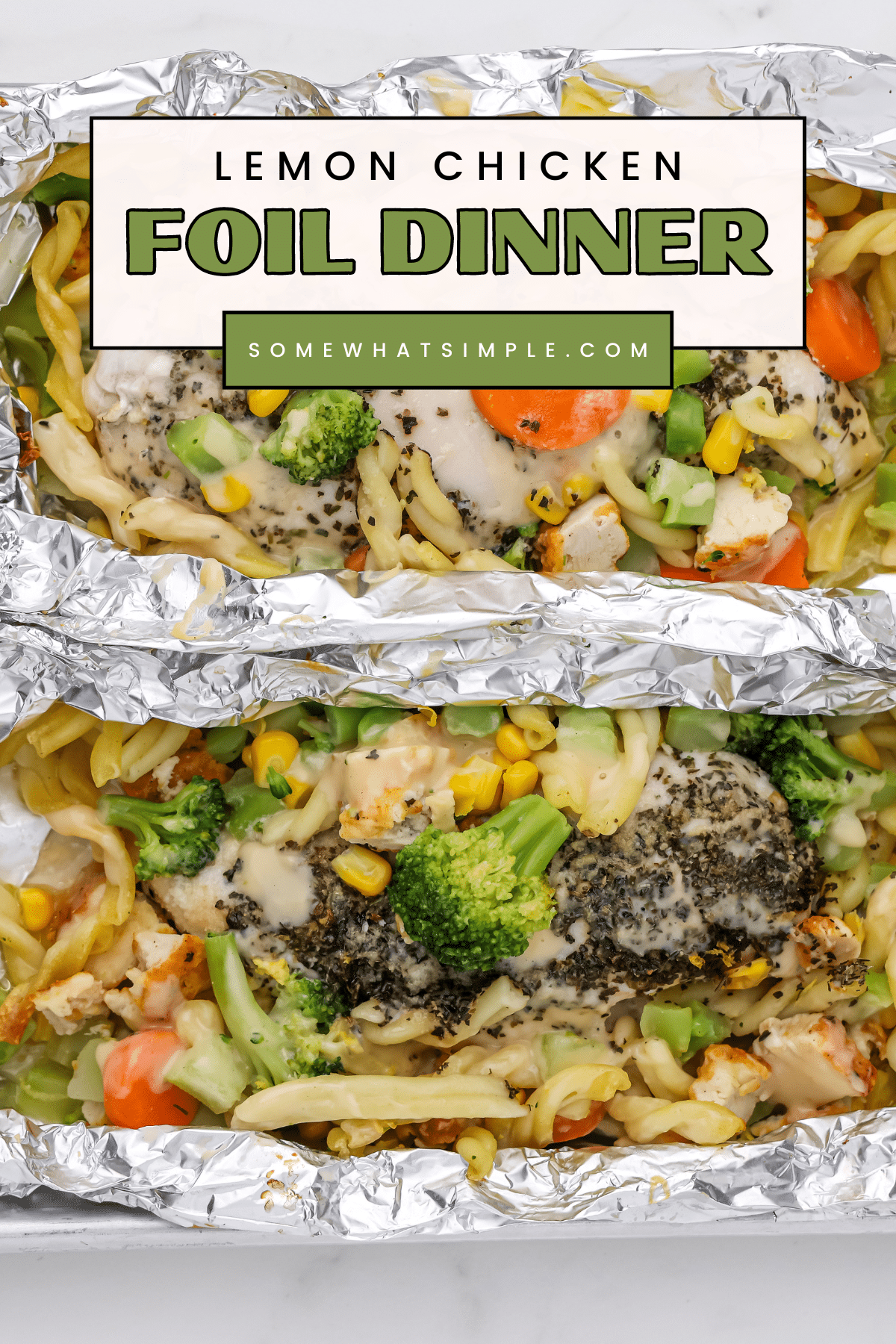 Get dinner on the table in less that 30 minutes with nearly no cleanup at all thanks to this delicious Lemon Chicken Pasta Foil Dinner! Foil dinners have all of the delicious flavors of camping without having to sleep outside. #foildinner #chicken #pasta #howtomakeafoilpacketdinner #easydinner via @somewhatsimple