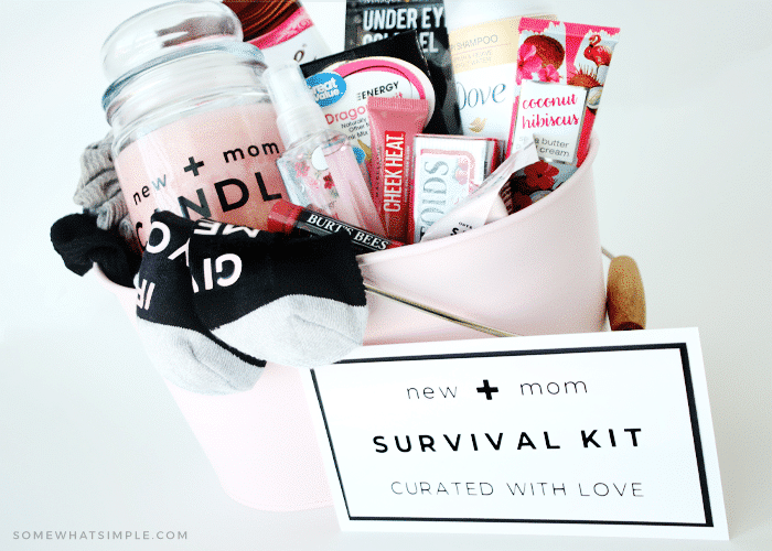 A basket full of items for a new mom - a candle, some chocolate, some lotion, cozy socks, etc. 