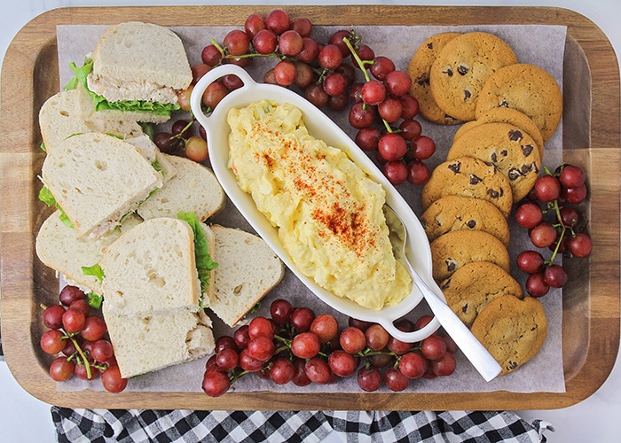 Picnics are a fun way to celebrate the summer with family and friends. These simple tips and tricks make it easy to throw the perfect picnic!