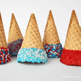 dipped holiday cones, lined up on a white counter