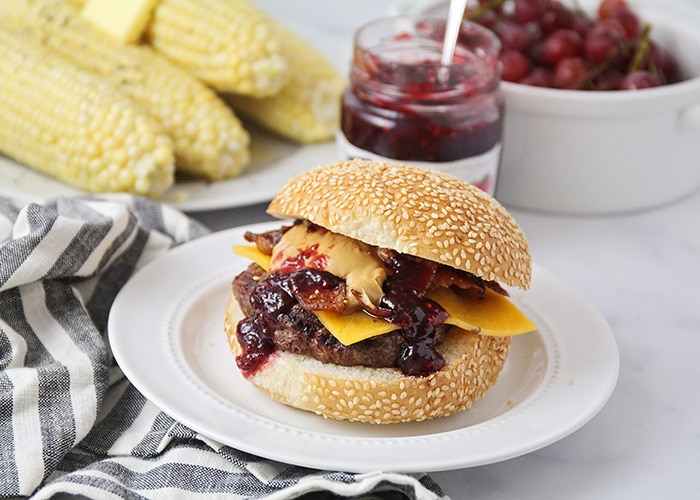 These peanut butter and jelly bacon cheeseburgers are over-the-top delicious, and so easy to make! They're a fun twist on a basic burger! 