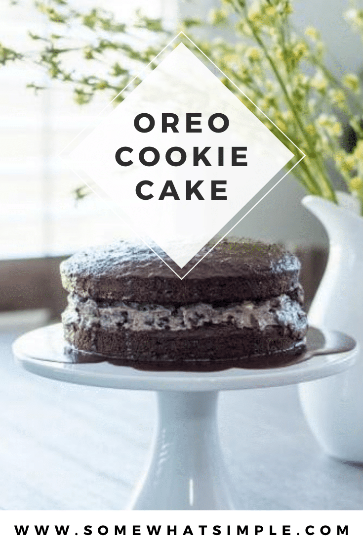 Oreo Cookie Cake is a fluffy 2-layer chocolate cake sandwiched with a cream cheese and Oreo frosting, then drizzled with melted chocolate. It's a delicious cake that looks fancy, but it couldn't be any easier to make! via @somewhatsimple