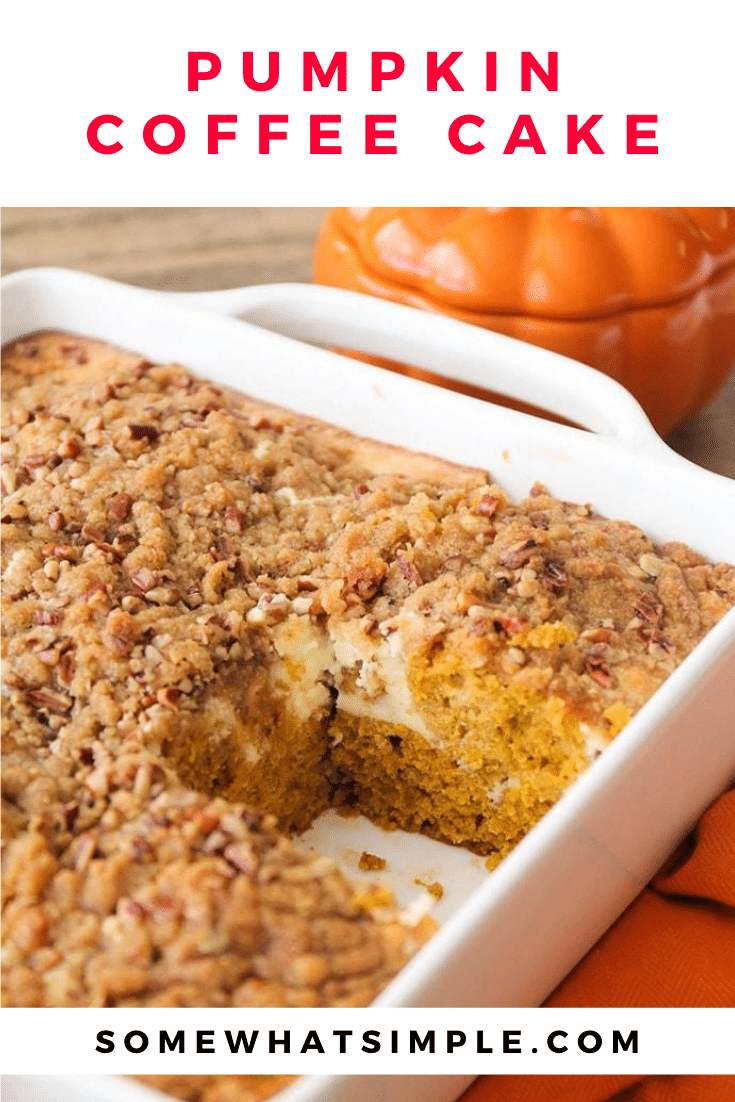 This pumpkin cream cheese coffee cake is so deliciously indulgent! Tender pumpkin cake with a sweet cheesecake layer, topped with a cinnamon pecan streusel. Made with cream cheese and pumpkin puree this coffee cake is going to knock your socks off! #pumpkincoffeecake #pumpkincreamcheesecoffeecake #falldesserts #easypumpkindessert #easypumpkincoffeecake via @somewhatsimple