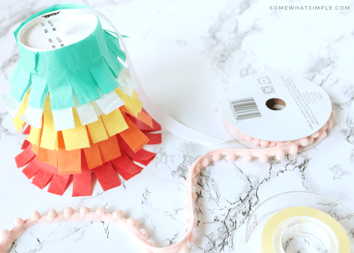 adding trim to the top of a pinata