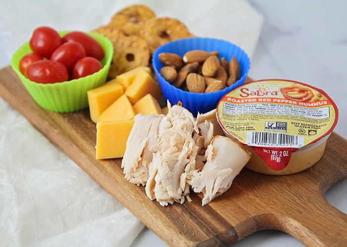 cutting board with snacks for kids