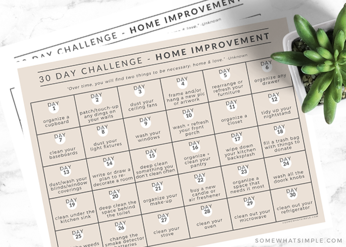 2 home improvement challenge calendars laid flat on a counter